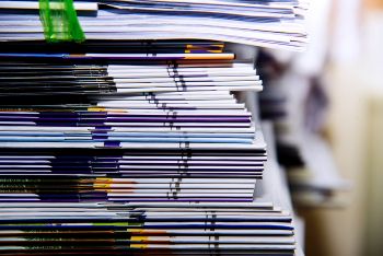 a pile of student records in an educational institution ready for shredding services